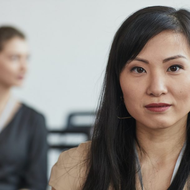 Asian Businesswoman in Audience